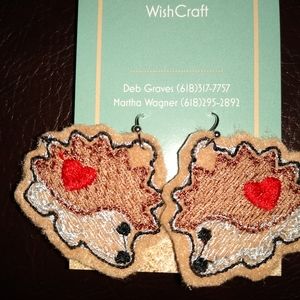 Hedgehog earrings.